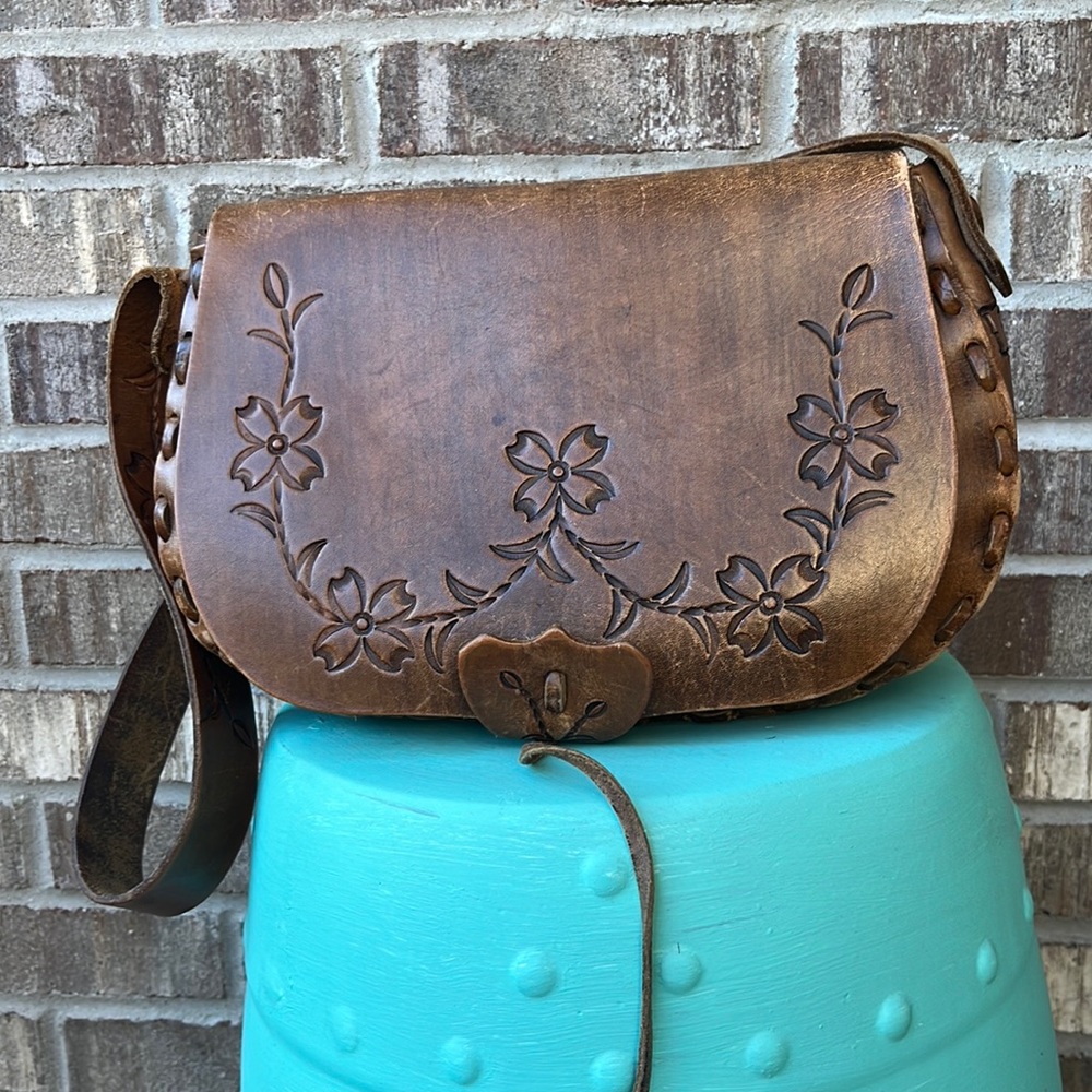 VINTAGE TOOLED LEATHER SADDLE BAG